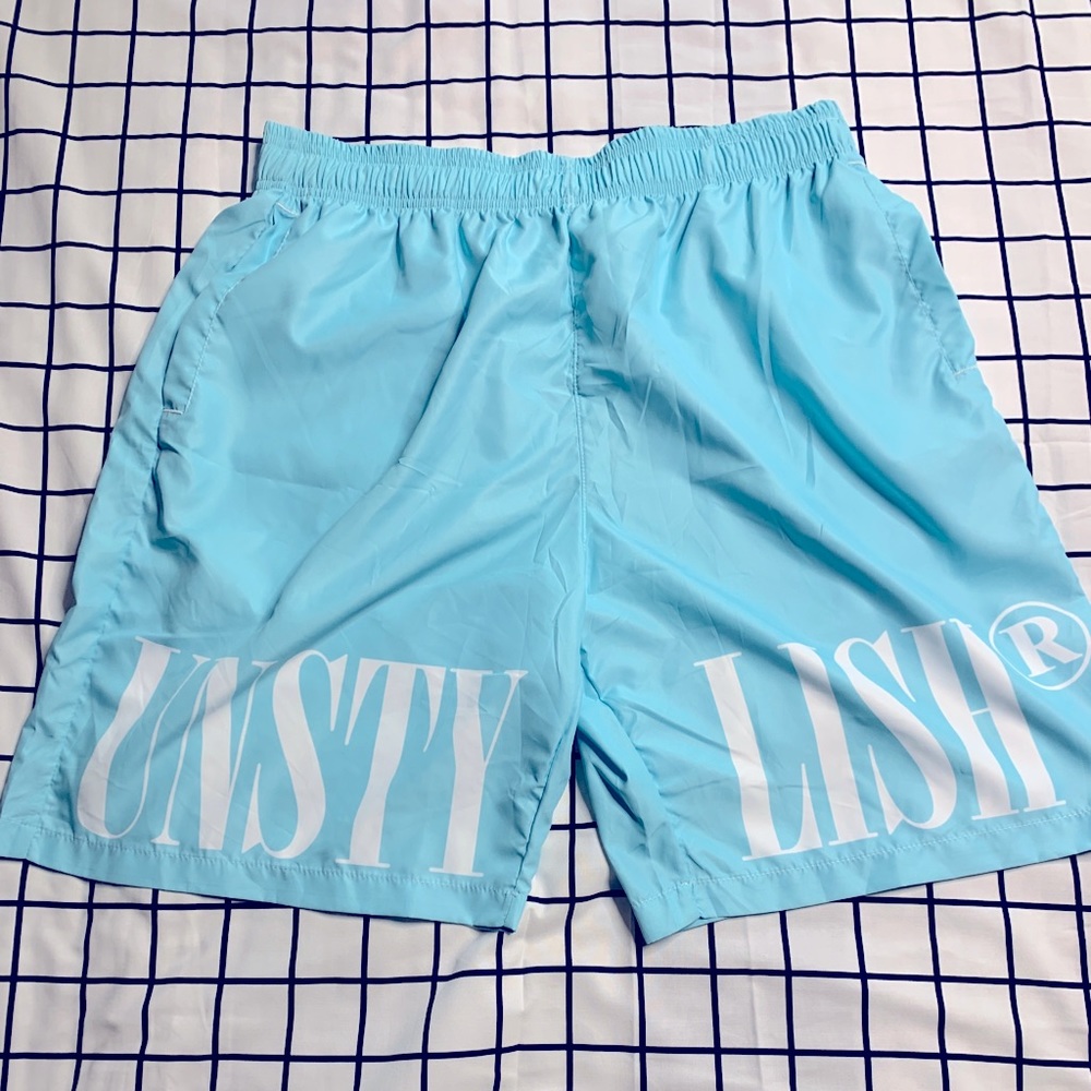 Blue Unstylish logo print shorts